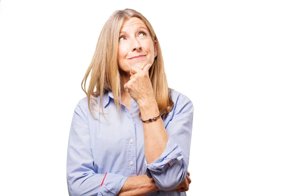 Senior beautiful woman doubting — Stock Photo, Image