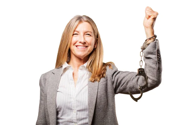 Senior beautiful woman with handcuffs — Stock Photo, Image