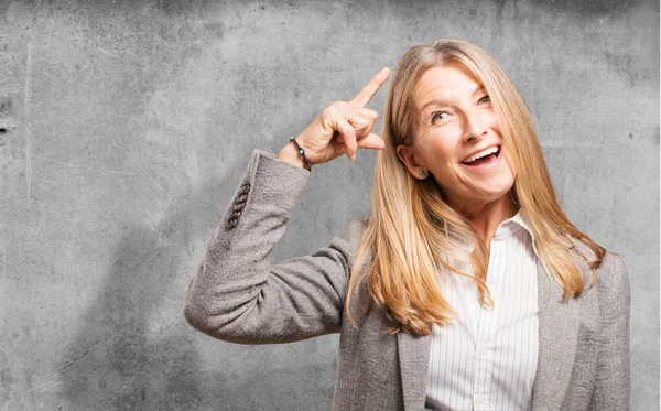 Senior beautiful woman having idea — Stock Photo, Image