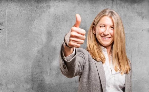 Senior beautiful woman with okay sign — Stock Photo, Image