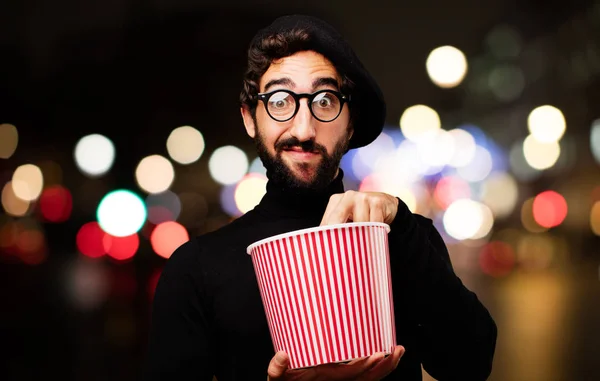 Young french artist with pop corn — Stock Photo, Image