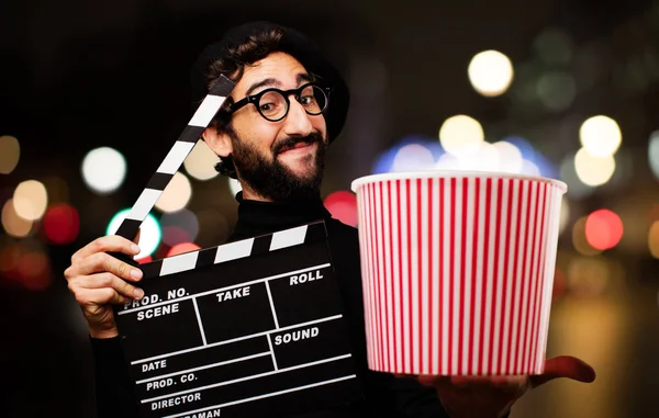 Franska konstnären med pop corn och SYNKRONKLAPPA — Stockfoto