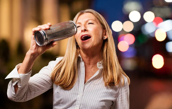 Senior beautiful woman with beer — Stock Photo, Image