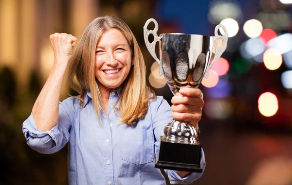 Senior beautiful woman with sport cup — Stock Photo, Image