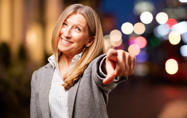 Senior beautiful woman pointing — Stock Photo, Image