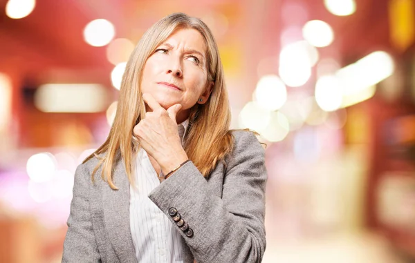 Senior beautiful woman thinking — Stock Photo, Image