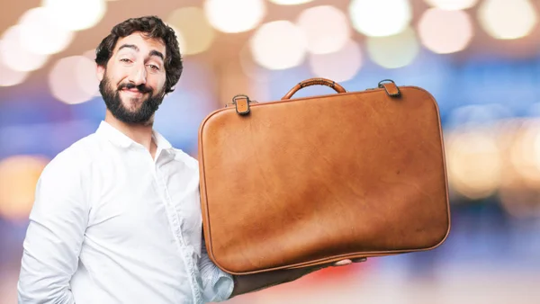 Young funny man with travel case — Stock Photo, Image