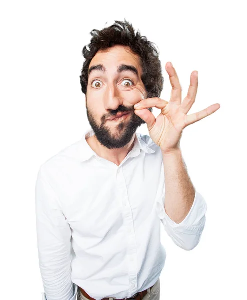 Man with silence gesture and worried expression — Stock Photo, Image