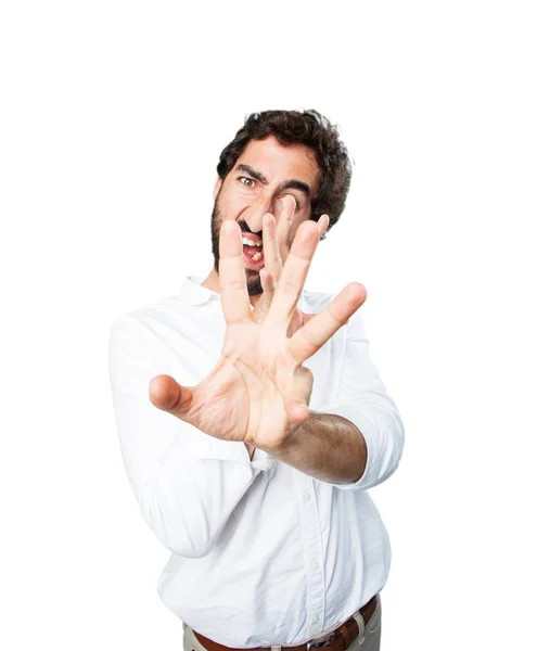 Man met stop gebaar en niet eens expressie — Stockfoto