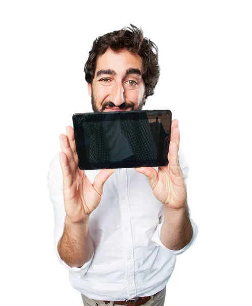 Joven hombre divertido con tableta de pantalla táctil —  Fotos de Stock