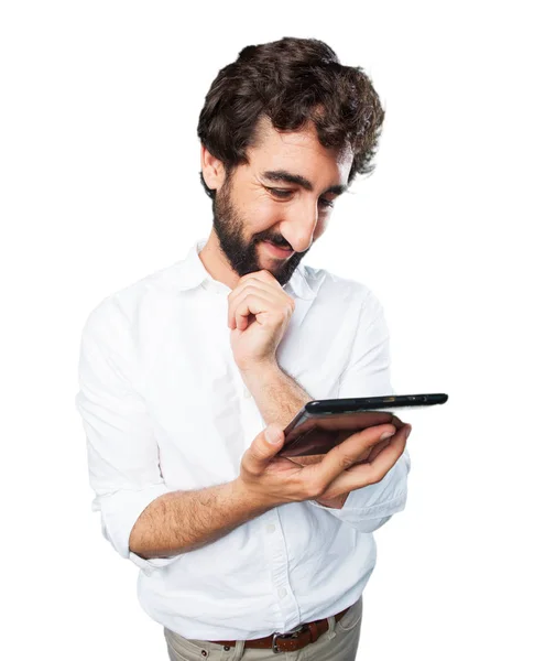 Jeune homme drôle avec tablette à écran tactile — Photo