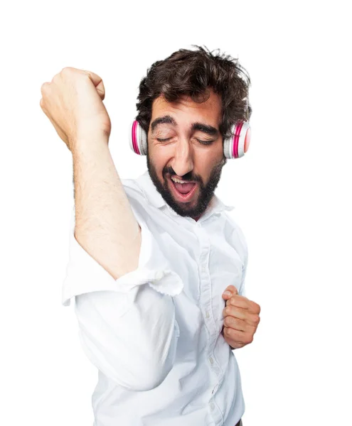 Joven divertido hombre con auriculares — Foto de Stock