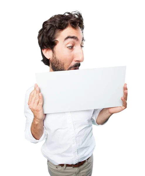 Young funny man with a placard — Stock Photo, Image