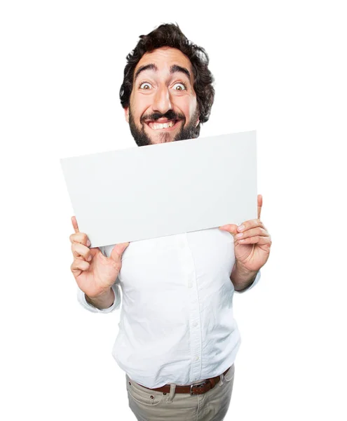 Young funny man with a placard — Stock Photo, Image