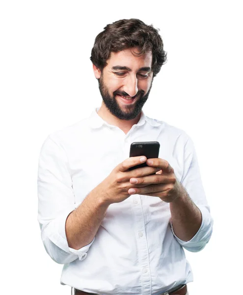Young funny man with mobile phone — Stock Photo, Image