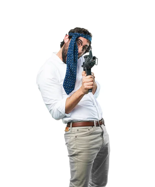 Man with machine gun and disagree expression — Stock Photo, Image