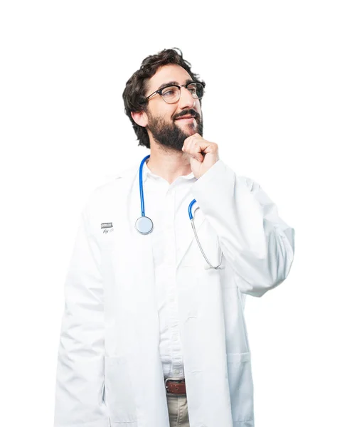 Jonge grappige dokter denken — Stockfoto