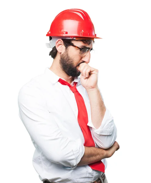 Funny architect thinking with sad expression — Stock Photo, Image