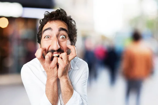 Funny man scared in worried pose — Stock Photo, Image