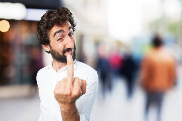 Jeune homme drôle en désaccord pose — Photo