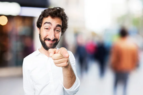 Joven divertido hombre señalando — Foto de Stock