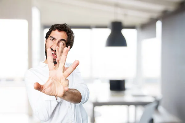 Man with stop gesture and disagree expression — Stock Photo, Image