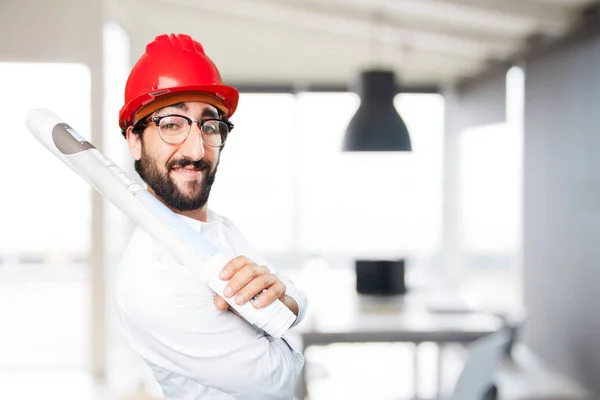 Arquiteto engraçado com planta em pose orgulhosa — Fotografia de Stock