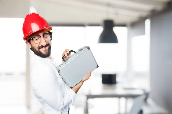 Grappige jongeman met een zaak — Stockfoto