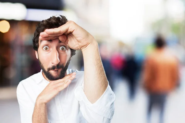 Homem mostrando gesto com expressão surpresa — Fotografia de Stock