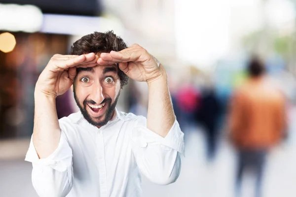 Man looking far with surprise expression — Stock Photo, Image