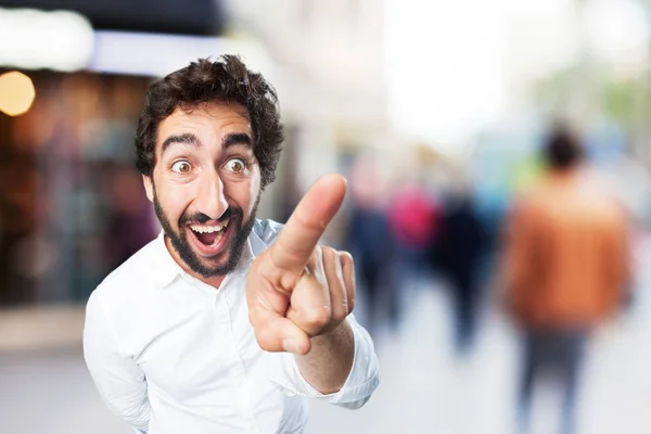 Joven divertido hombre tocando la pantalla — Foto de Stock