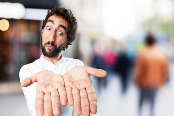 Homme montrant signe avec expression surprise — Photo