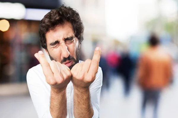 Man with money sign and sad expression — Stock Photo, Image