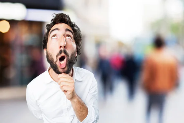 Funny man thinking with surprise expression — Stock Photo, Image