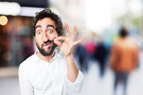 Homme avec geste de silence et expression inquiète — Photo