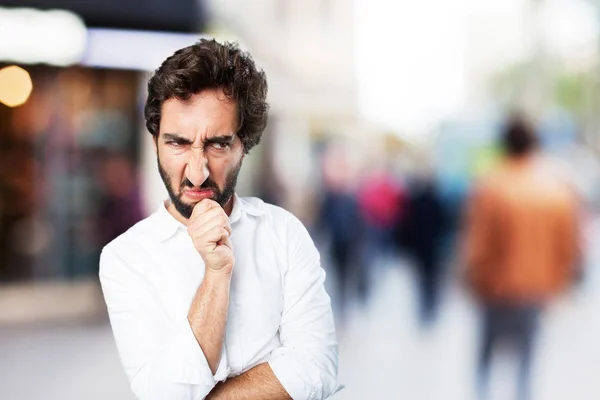 Uomo divertente pensare con espressione in disaccordo — Foto Stock