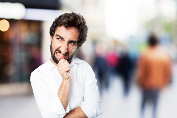 Funny man thinking with disagree expression — Stock Photo, Image