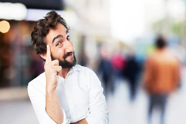 Joven divertido hombre pensando — Foto de Stock