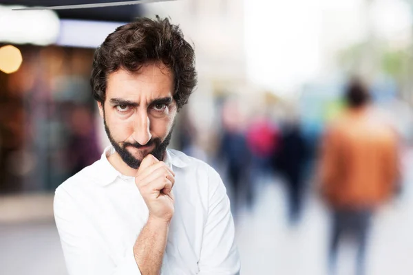 Funny man thinking with disagree expression — Stock Photo, Image