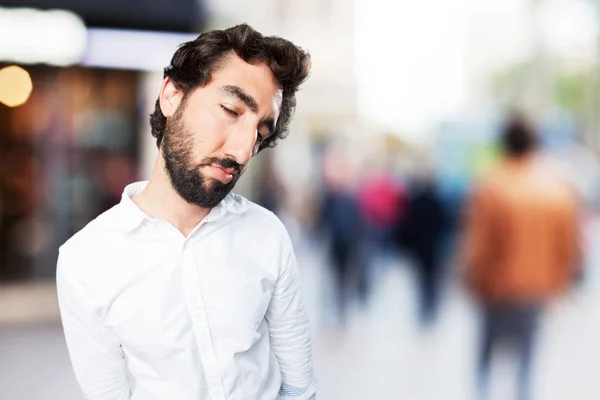 Man in boring pose with sad expression — Stock Photo, Image