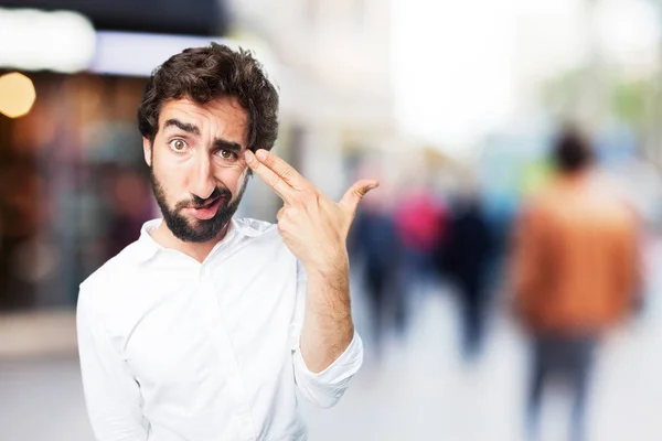 Uomo con gesto suicida in posa preoccupata — Foto Stock