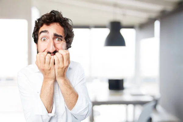 Funny man scared in worried pose — Stock Photo, Image