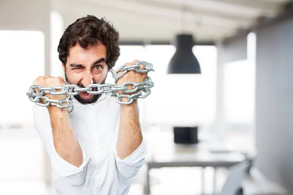 Uomo divertente con catena ed espressione in disaccordo — Foto Stock