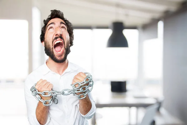Uomo divertente con catena ed espressione in disaccordo — Foto Stock