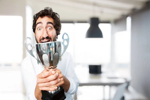 Homme avec une tasse et expression surprise — Photo