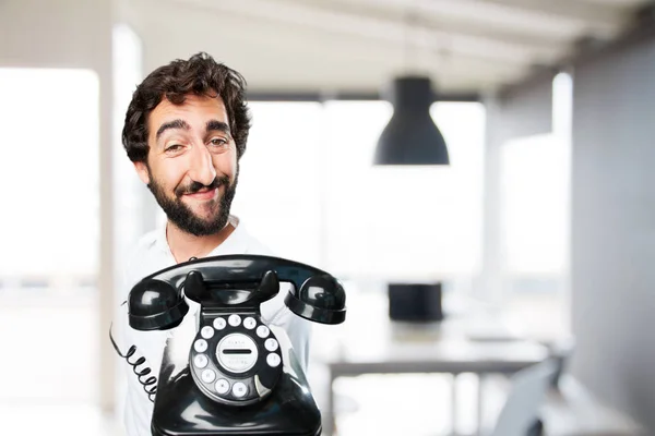 Young funny man with vintage telephone — Stock Photo, Image