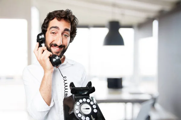 Young funny man with vintage telephone — Stock Photo, Image