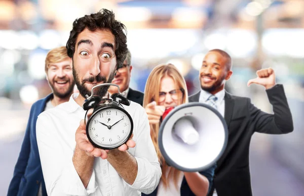 Young funny man with clock — Stock Photo, Image