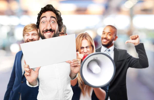 Young funny man with a placard — Stock Photo, Image