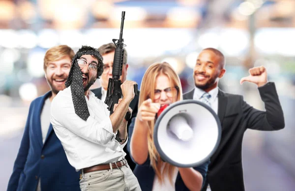 Uomo con mitragliatrice ed espressione in disaccordo — Foto Stock